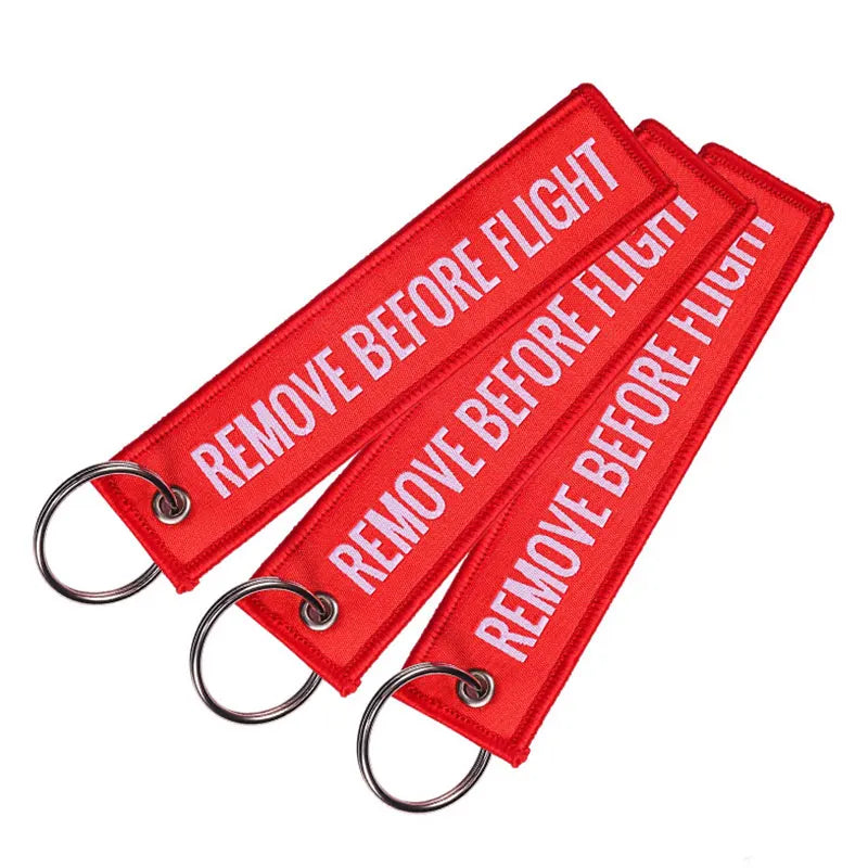 Remove Before Flight Red Keychain